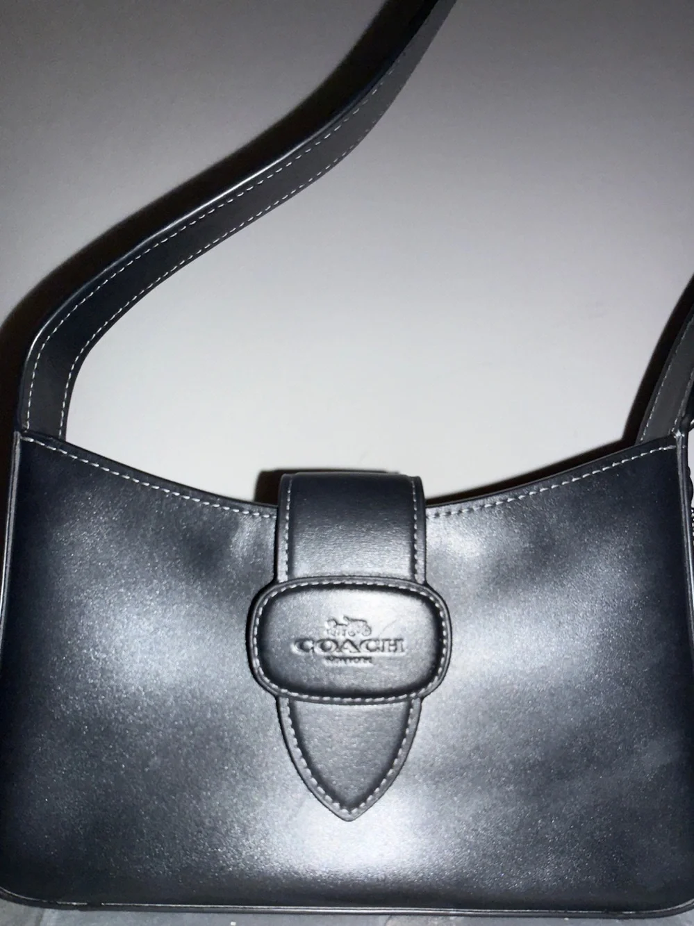 Coach “Eliza” Black Leather Shoulder Bag with Tab Closure